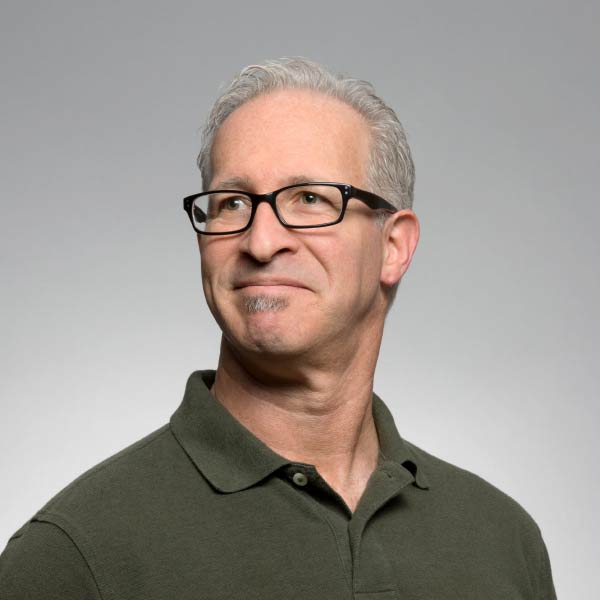 Friendly middle-aged man looking thoughtfully - Supply Chain Transparency