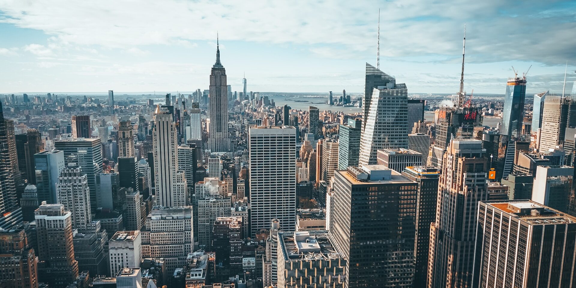 Aerial view of the New York City skyline, showcasing numerous skyscrapers. - Supply Chain Transparency
