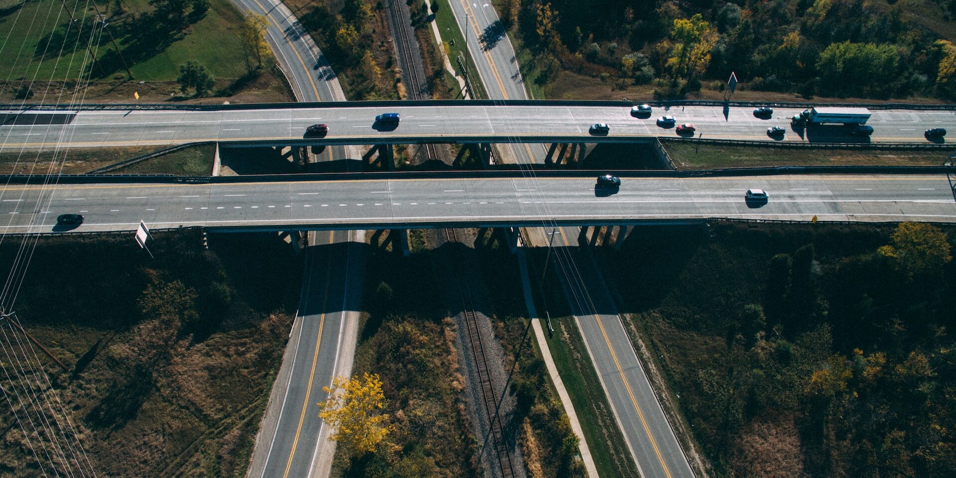 Sustainable Supply Chains: Strategies for Environmental Responsibility Aerial view of highway interchange, showcasing efficient transportation infrastructure. - Supply Chain Transparency