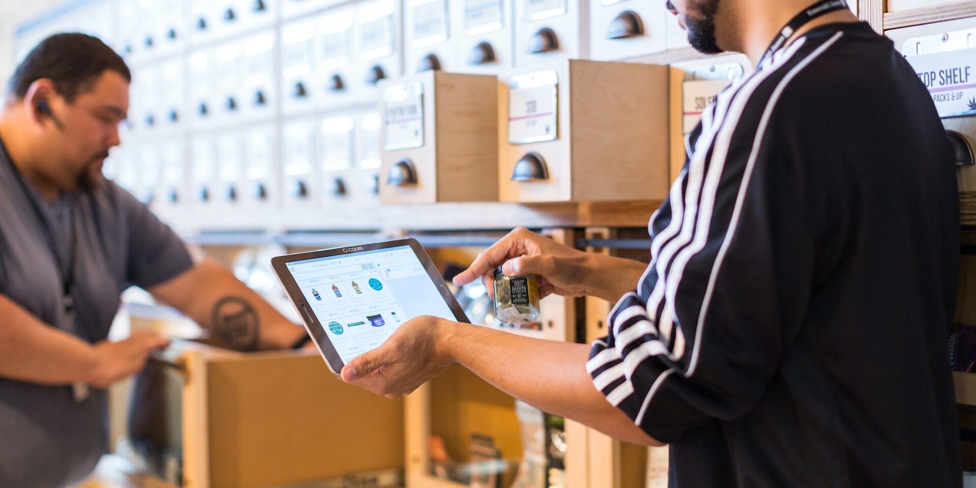 The Human Element: Addressing Employee-Related Fraud in Supply Chains Employee uses tablet to manage inventory in a warehouse, optimizing supply chain. - Supply Chain Transparency