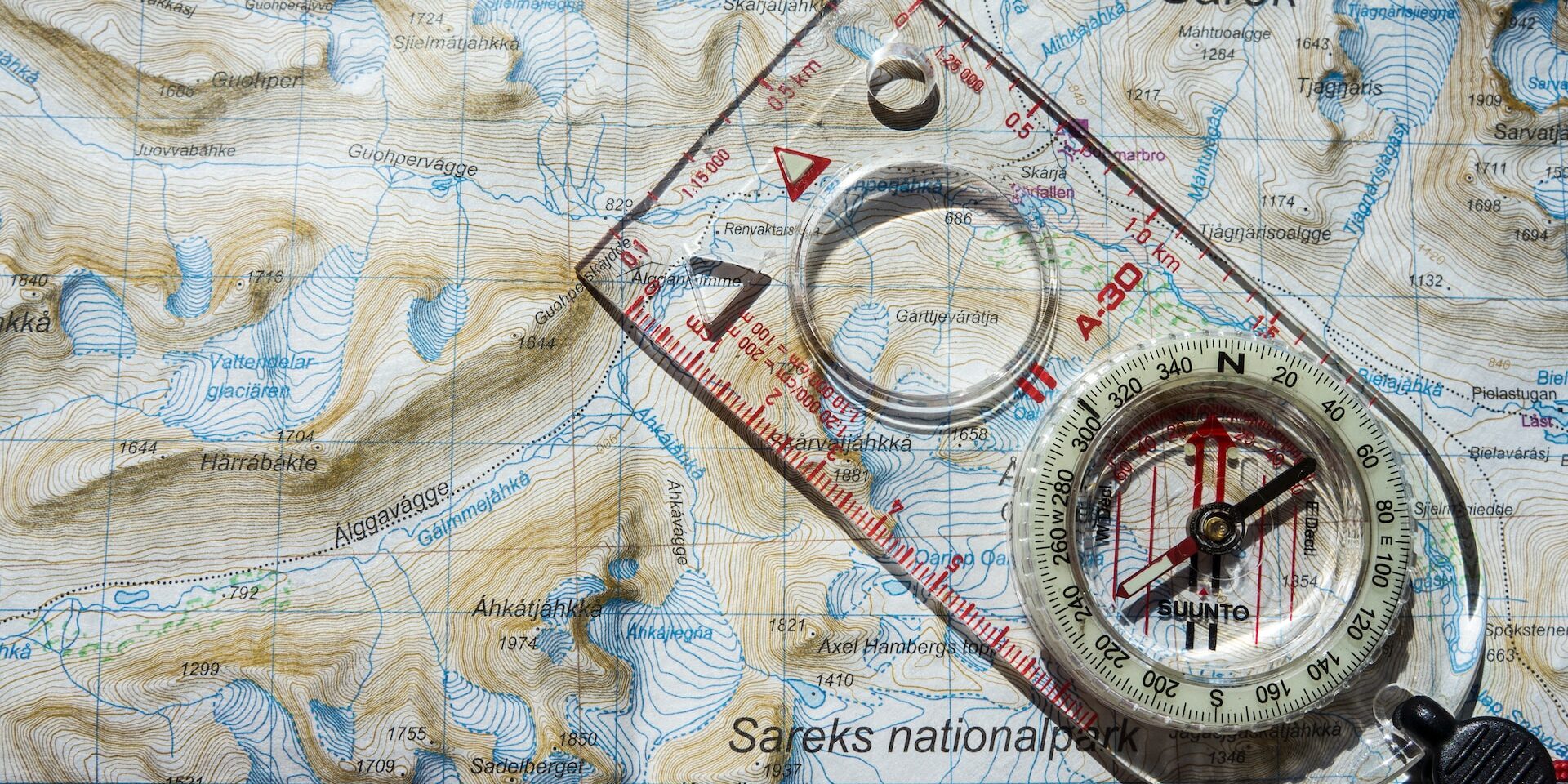 Trade Compliance: Navigating Regulations and Requirements Map with compass and ruler, illustrating navigation tools for trade compliance. - Supply Chain Transparency