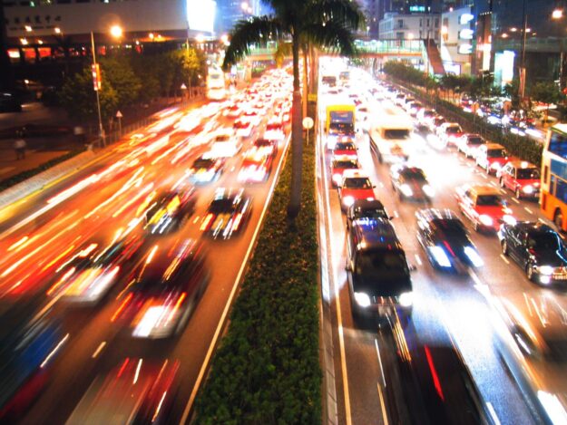 hong-kong-cars-1447878 Nighttime traffic jam on a busy Hong Kong highway. Cars' taillights blur in motion. - Supply Chain Transparency