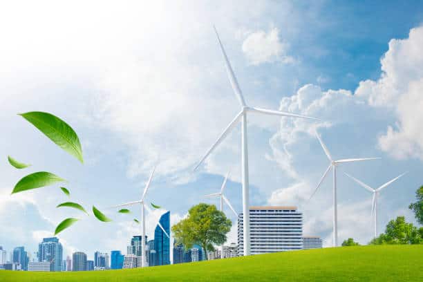 istockphoto-1461744851-612×612 Wind turbines and cityscape with green leaves, representing clean energy and New Jersey's offshore wind investment. - Supply Chain Transparency